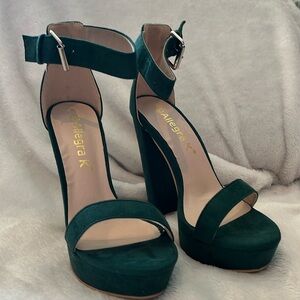 Size 6, 5 inch heel, emerald green ankle buckle shoes